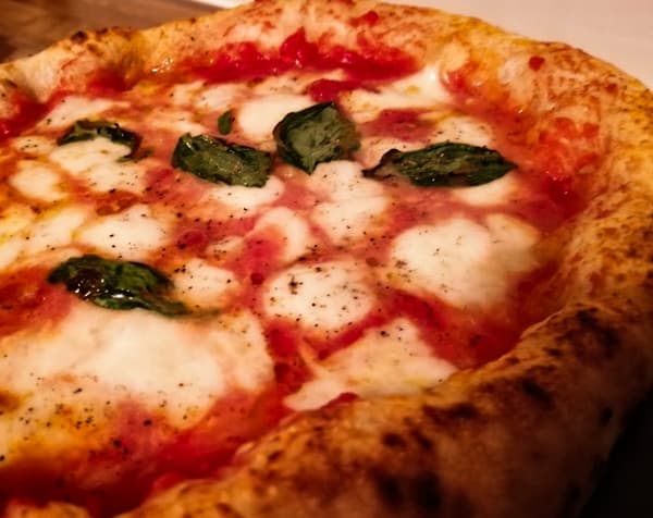 A beautiful Neapolitan pizza that has been well kneaded