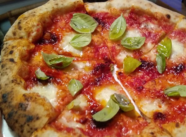 Adding basil after the homemade pizza is cooked is a great tip that boosts flavour