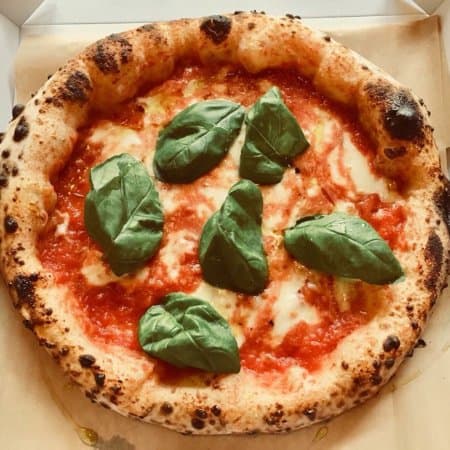 Neapolitan pizza in pizza box