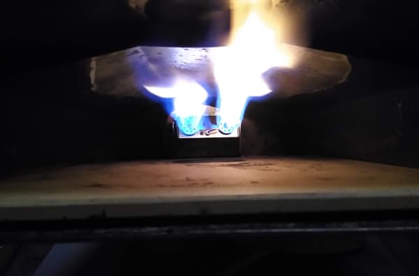 The gas attachment on an Ooni pizza oven