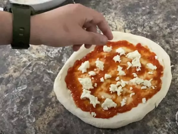 Modest cheese on pizza