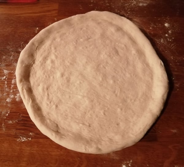 Stretching pizza dough