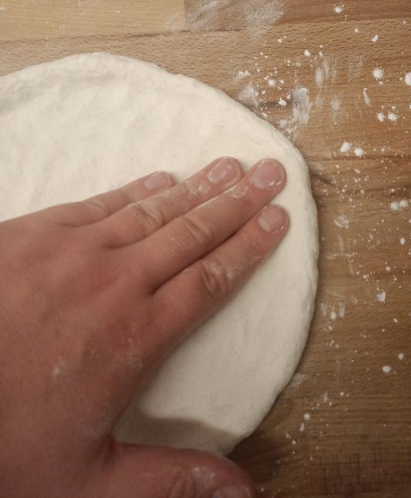 Stretching gluten free pizza dough