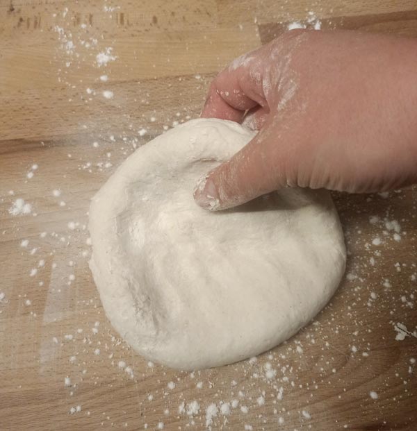 Turning gluten free pizza dough