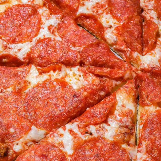 New York Pepperoni pizza slices