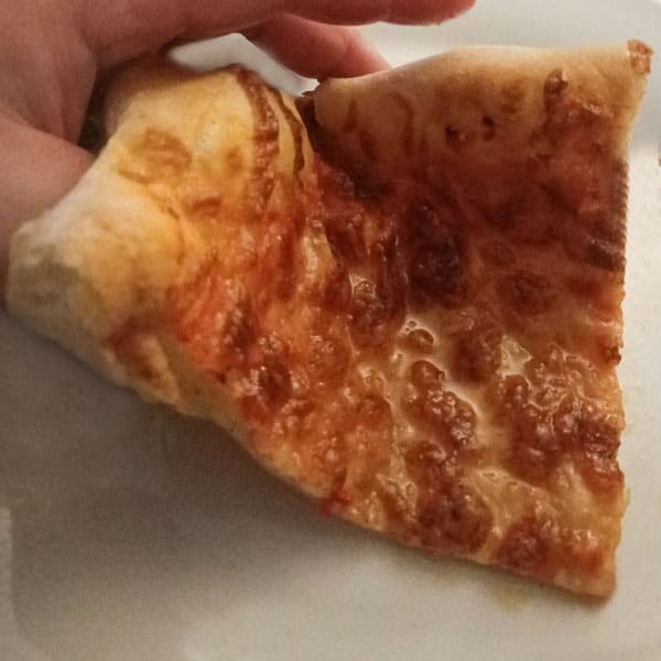 New York pizza slice on plate